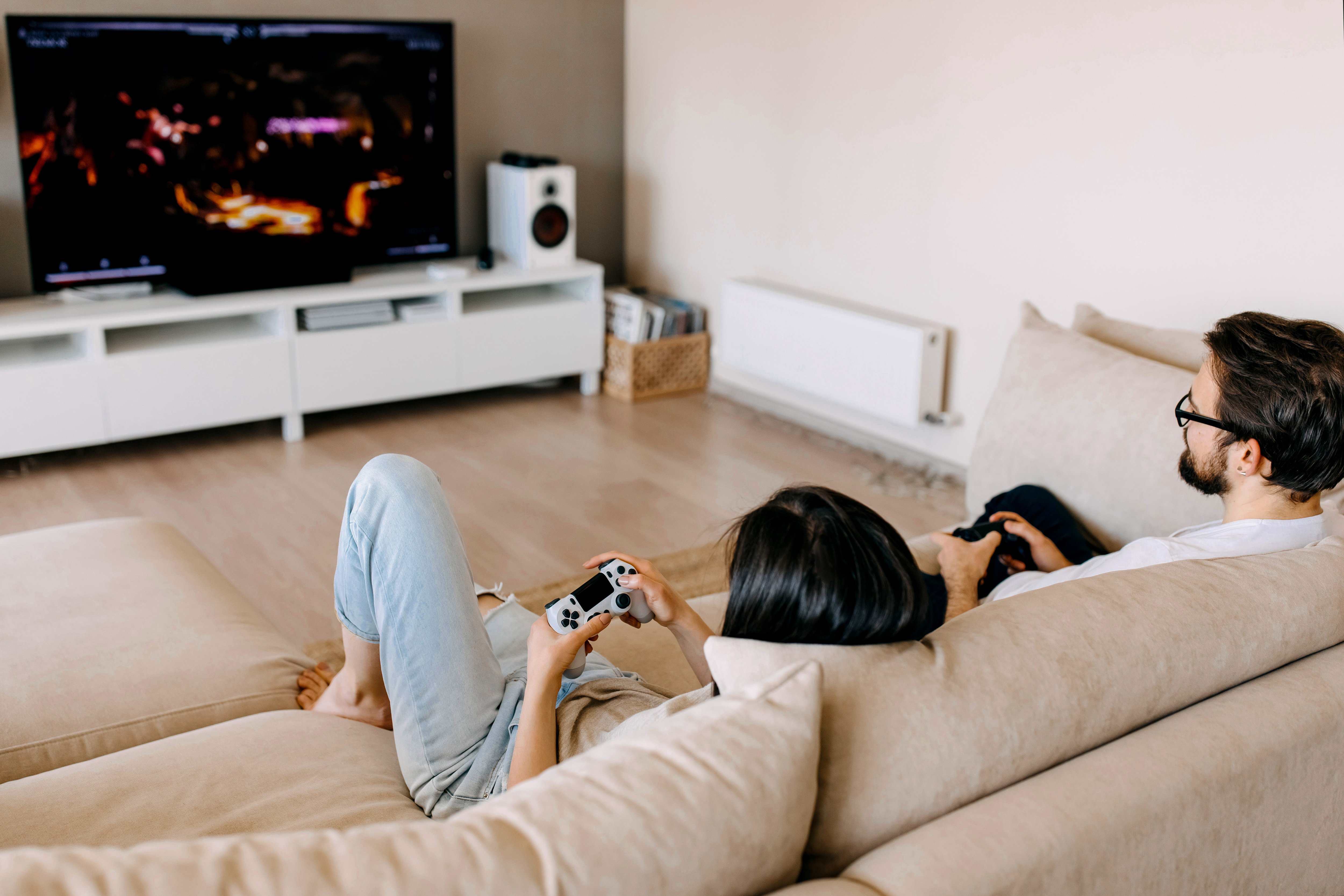boy and girl couple playing video game